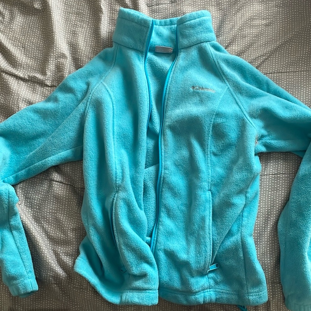 A cyan medium size jacket was barely used also a good quality